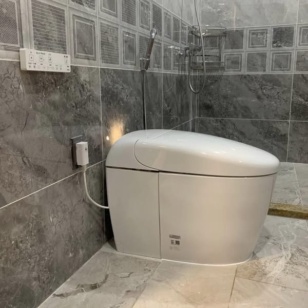 Bồn cầu thông minh TOTO TCF9520 nguyên khối tự động rửa